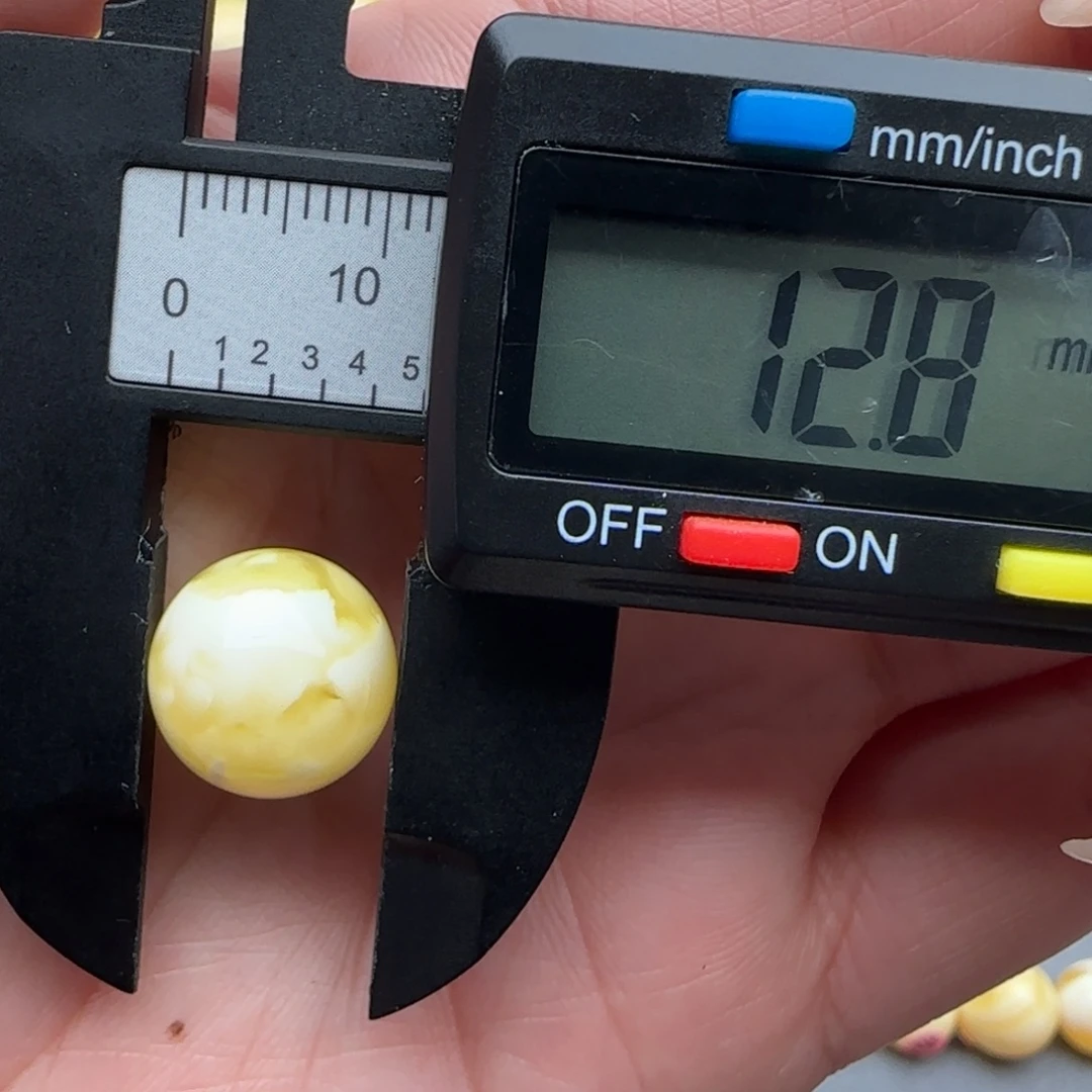 蜜蜡未镶嵌裸石瓷白妖花珠子