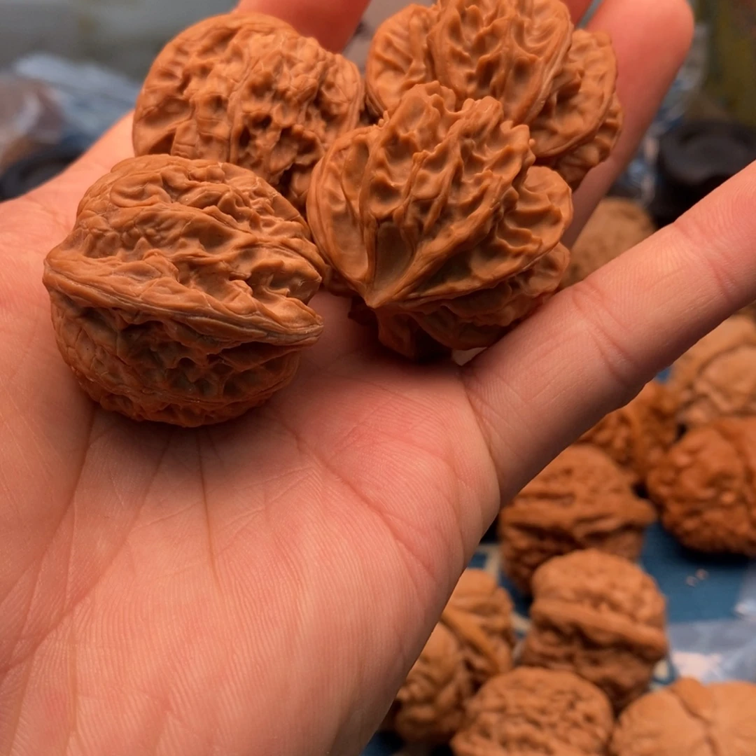 A***总吊坠桃核文玩核桃手把件