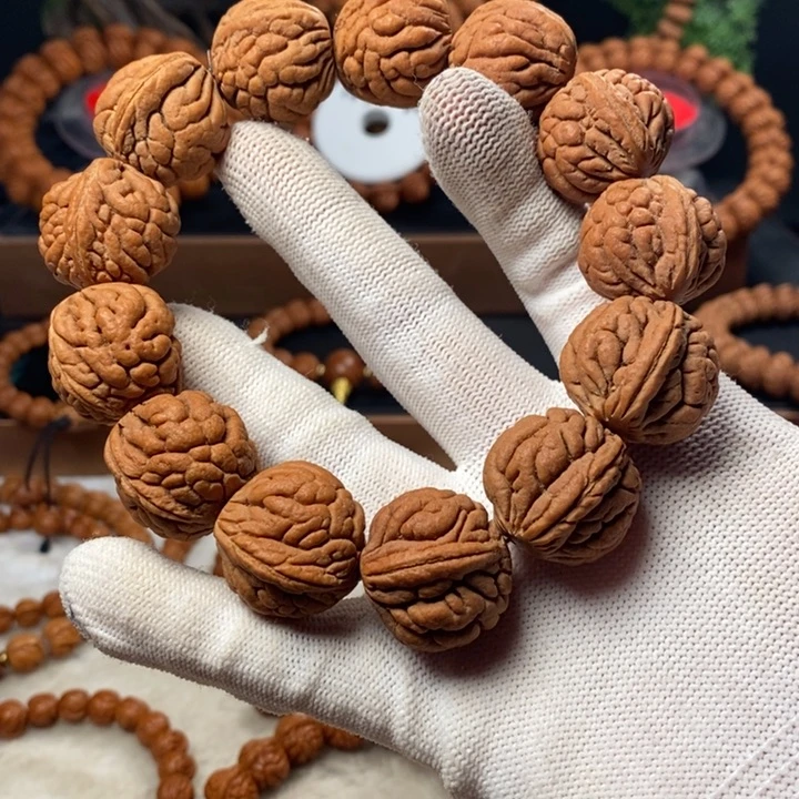 桃核吊坠齐**人秦岭龙纹