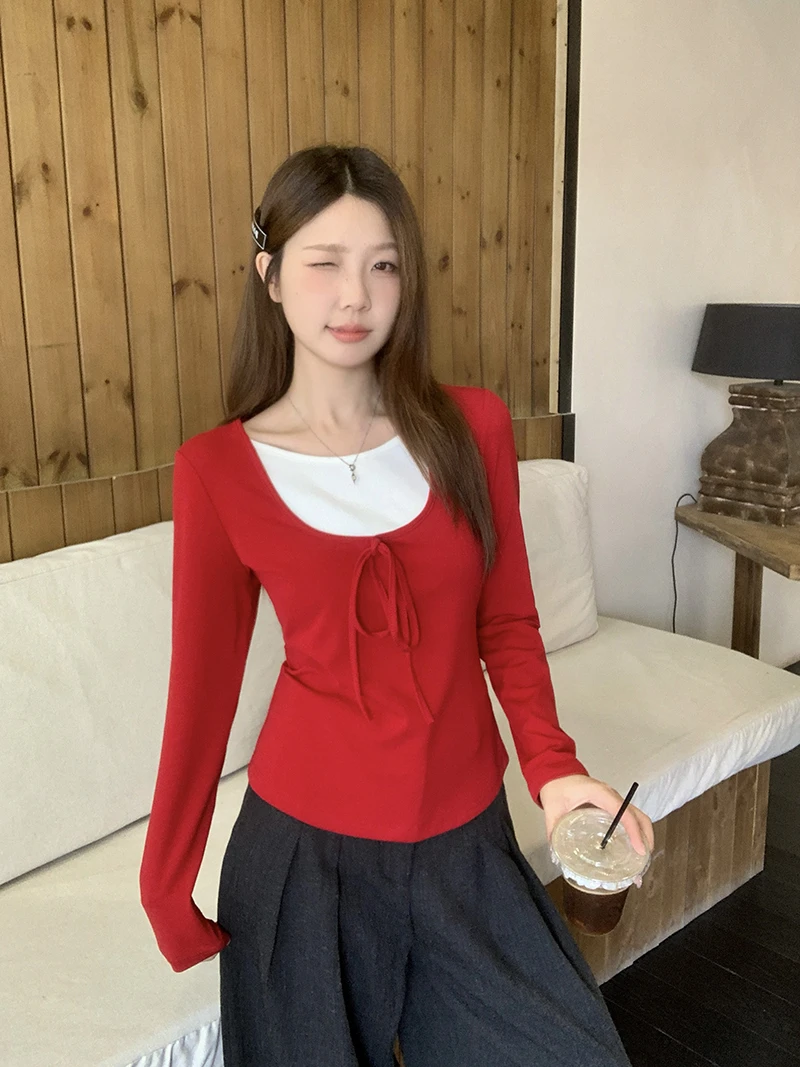 2025秋装新款胖mm大码女时尚撞色蝴蝶结绑带长袖T恤36009