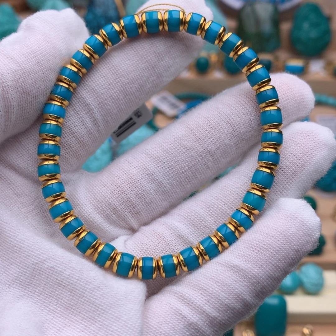 玲***g绿松石18K金镶嵌珠宝奇石