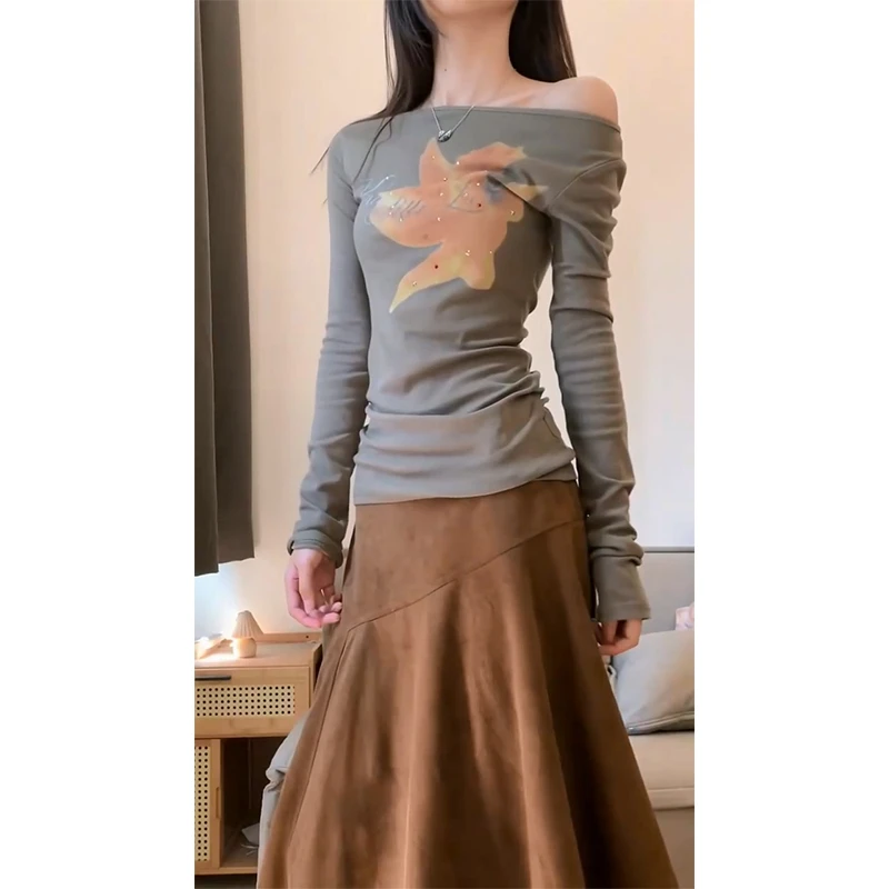 2025早秋新款韩系穿搭修身露肩印花长袖上衣设计感高腰显瘦半身裙