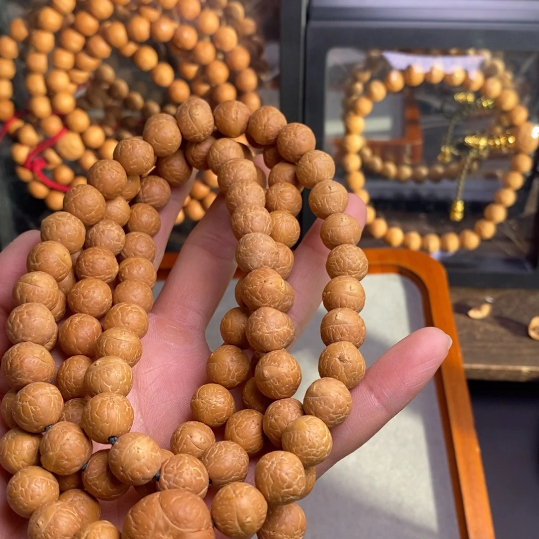 受***蟹凤眼菩提手串11凤眼