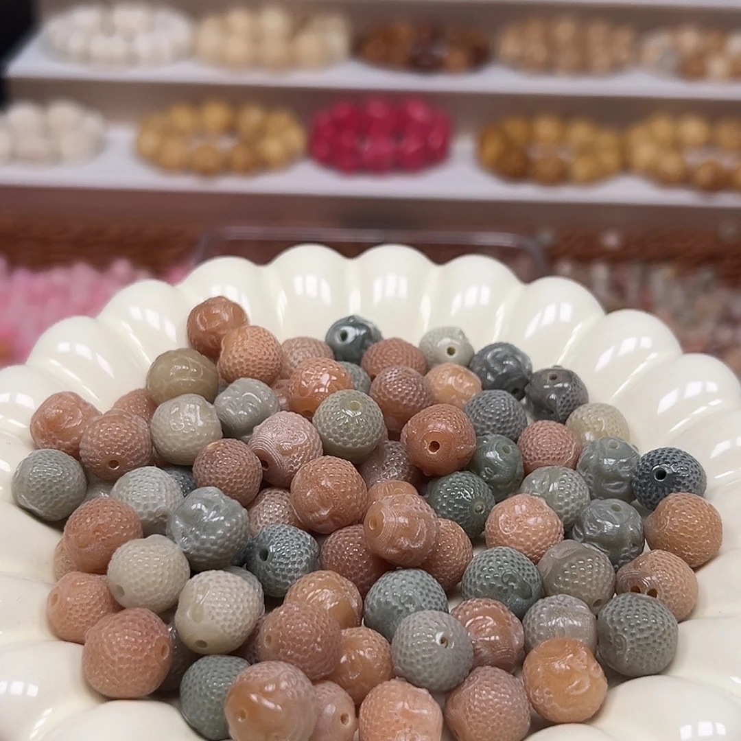 菩提根/象牙果手串微瑕多宝佛头50颗