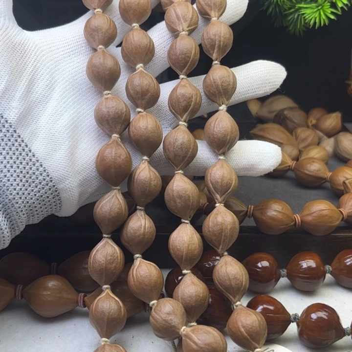 宝***剑橄榄核手串/手链1.5*2.0原皮三花铁核脖挂55颗