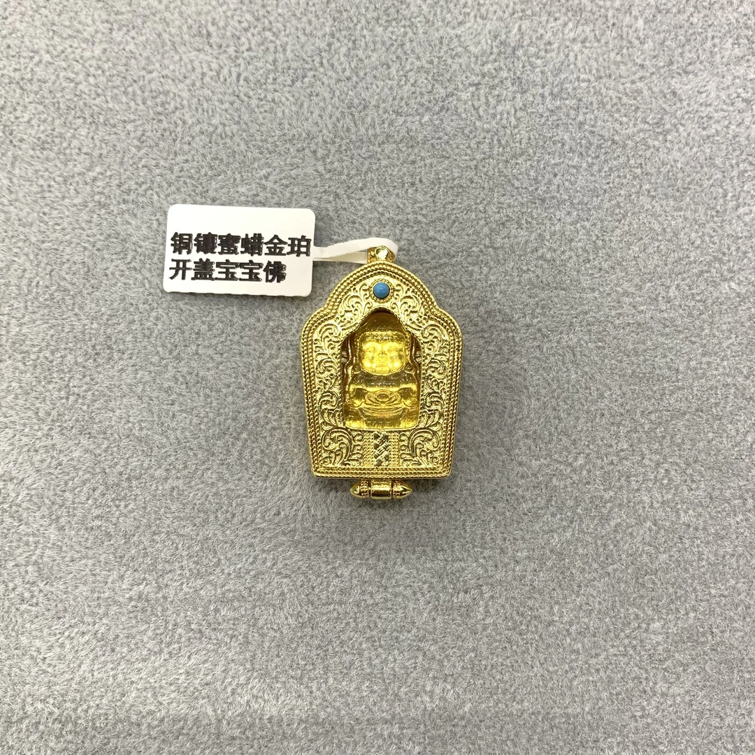 金珀镶嵌开盖宝宝佛
