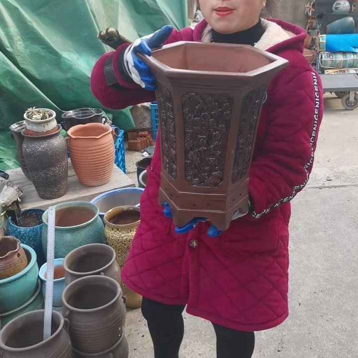 红陶口27高35瑕疵口裂