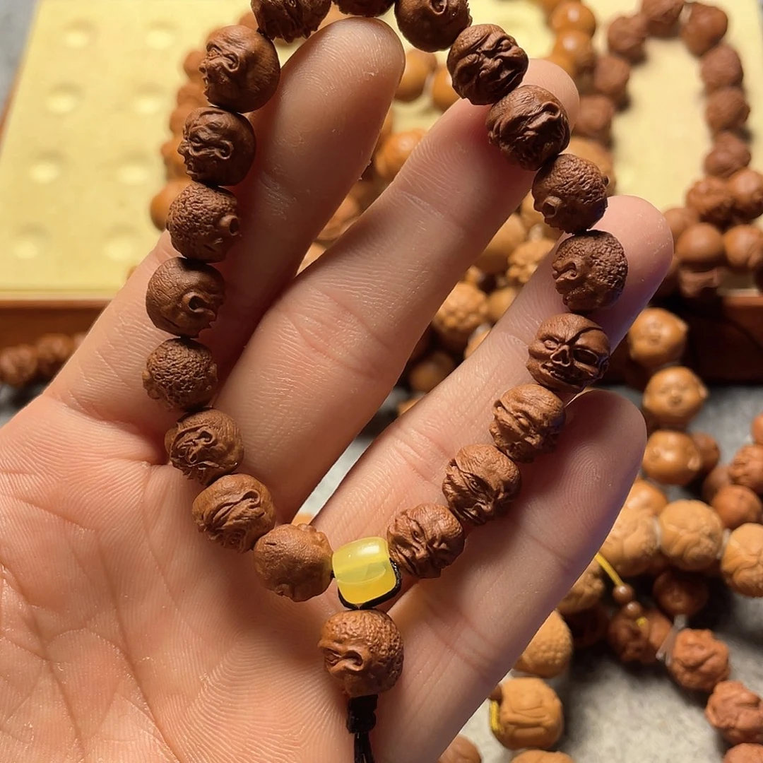 龙纹桃核雕刻向死而生