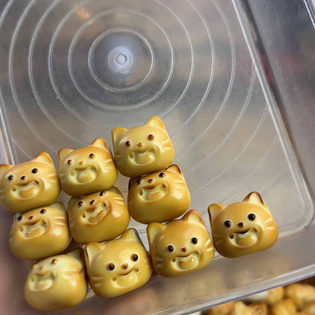 余***心手串菩提根/象牙果微瑕牙果大尺寸炭烤呲牙猫10颗