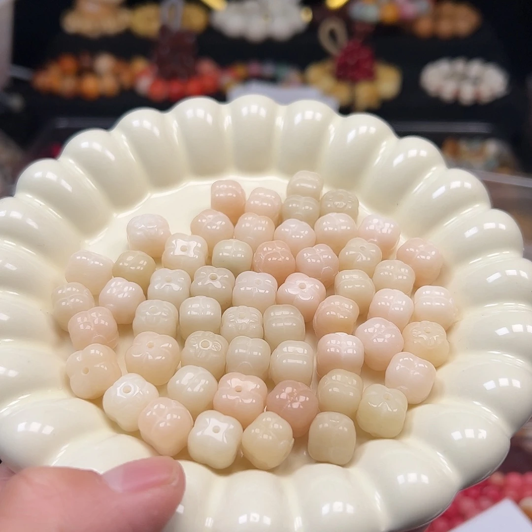 菩提根/象牙果手串20颗狮子白粉色