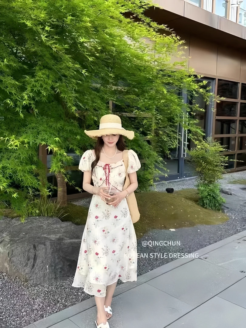 夏日清新甜美法式气质设计感收腰碎花泡泡袖连衣裙子女显瘦a字裙