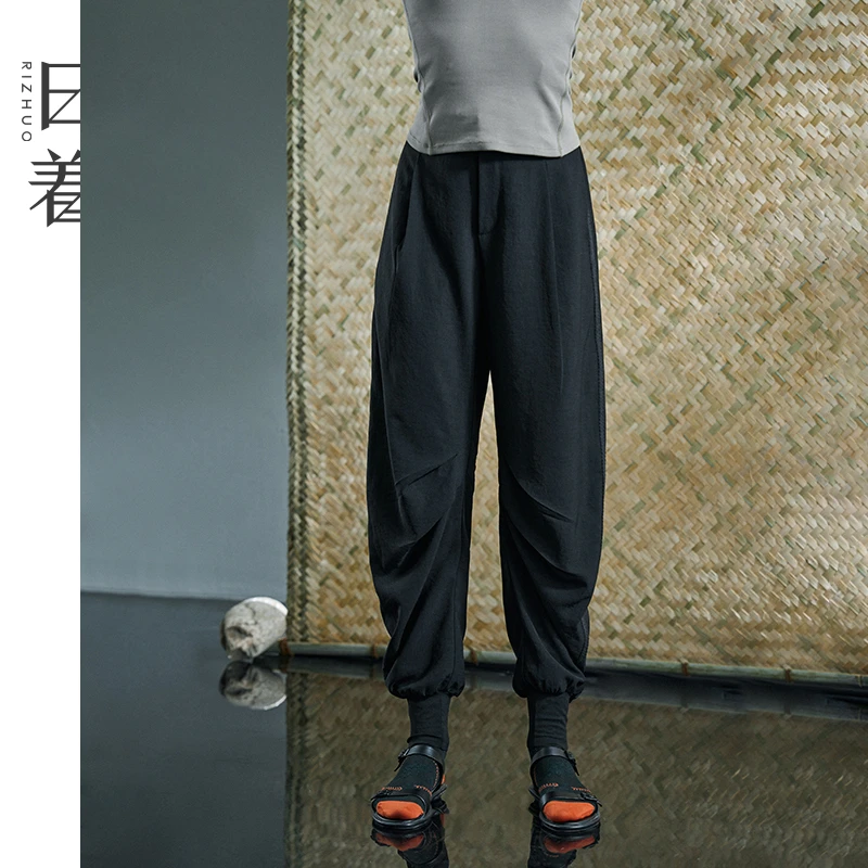 日着侠2025夏季新款小脚哈伦休闲裤宽松设计感流行长裤女RD2242K0