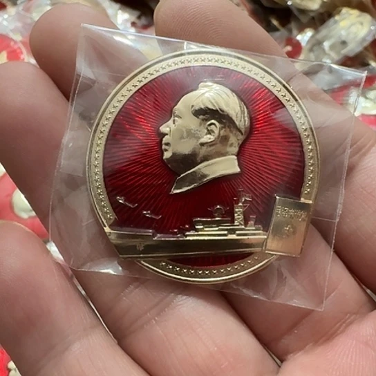 朤***鼒其他普通金属圆形红色人物形象