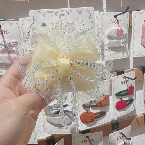 A182-mg黄色蝴蝶结串珠压夹【满15包邮发货】可爱仙女儿童发饰