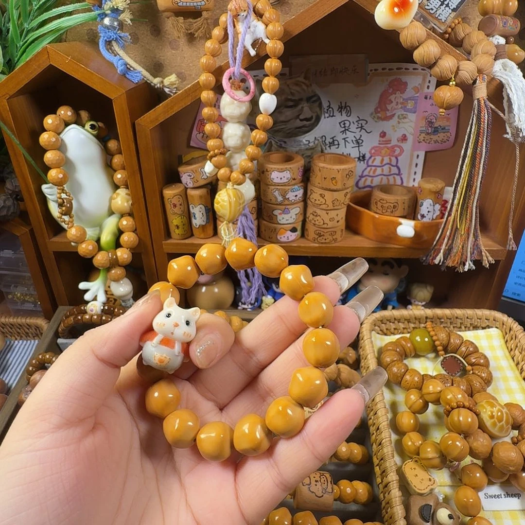 我***）吊坠猴头核桃星星手串