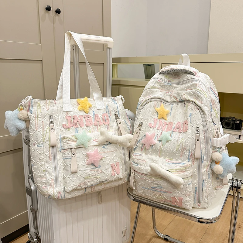 儿童书包女生小学生2025新款初中生高颜值背包高中可爱女孩双肩包