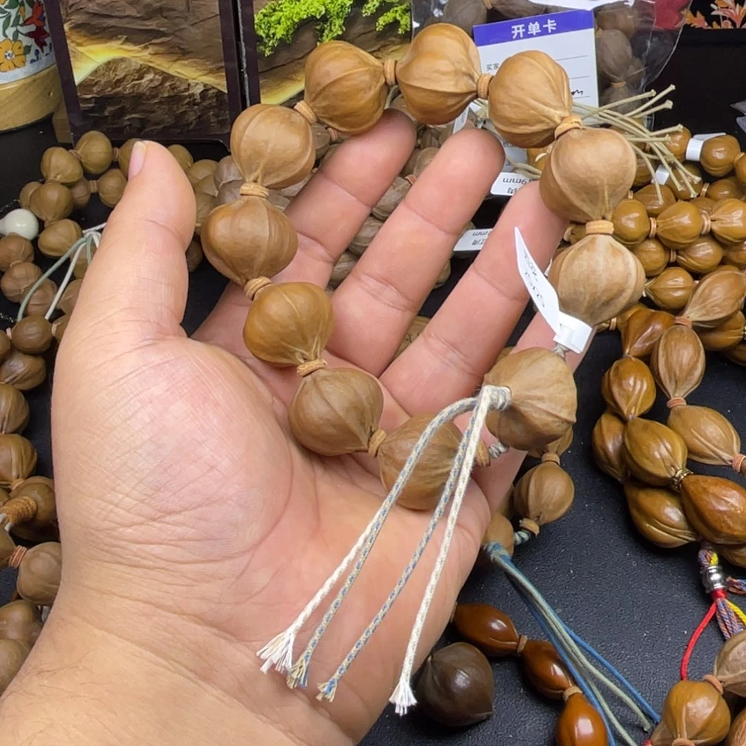 关***哥手串橄榄核25x25四花