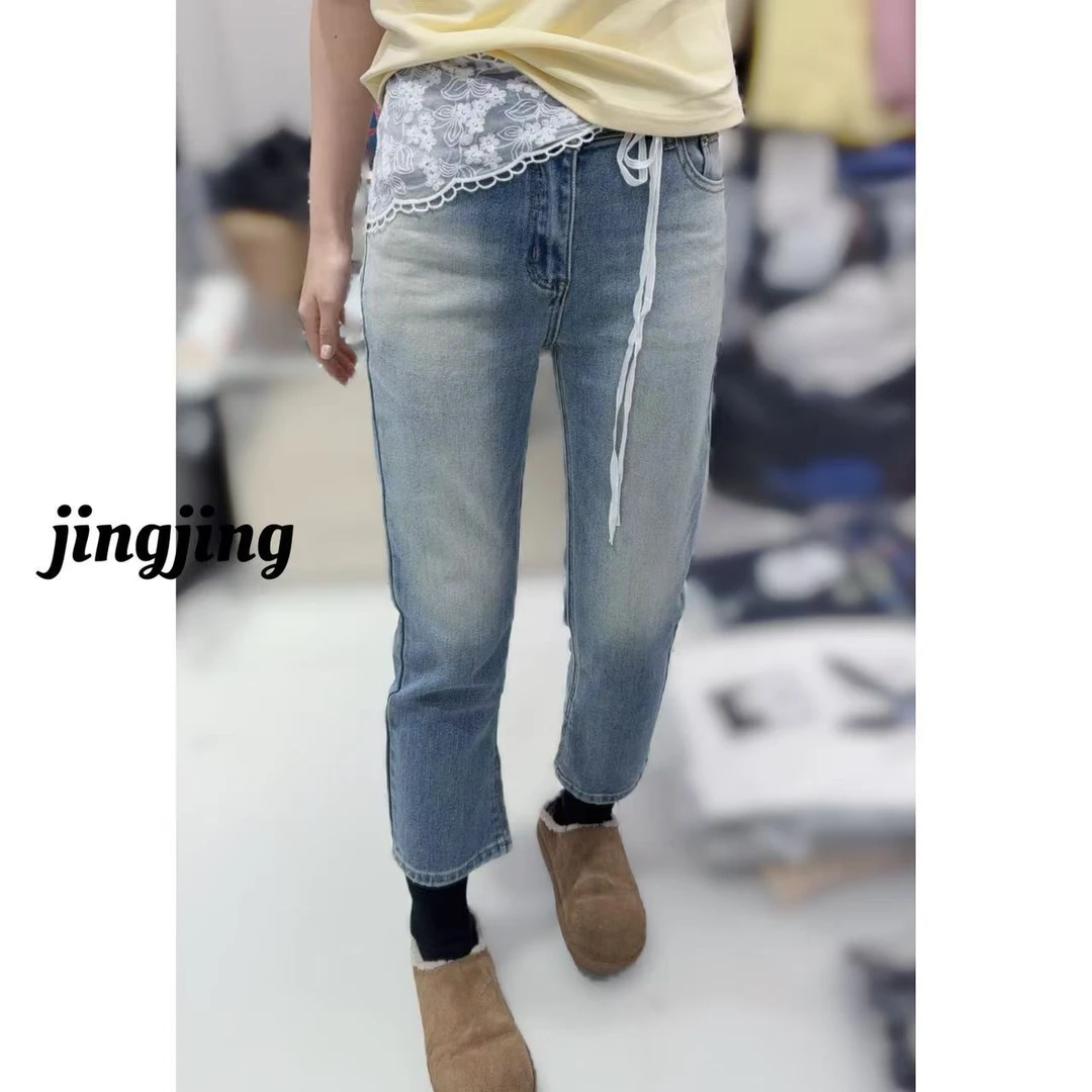 早春新款休闲百搭开叉烟管蕾丝腰带牛仔裤（68032）