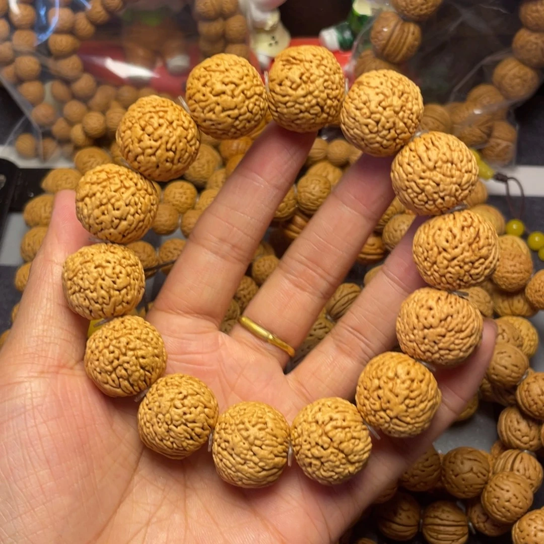 吊坠桃核吃**的19.8龙鳞凤尾手串