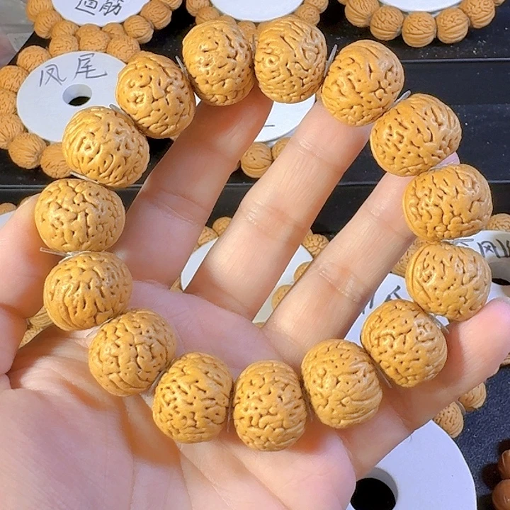 L***c桃核吊坠肌肉磨盘