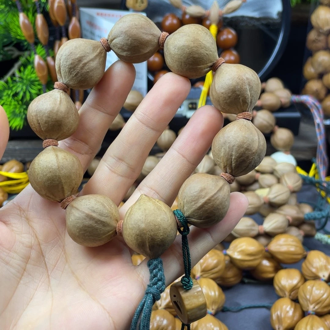 顶***见吊坠橄榄核005.23x26老料正圆