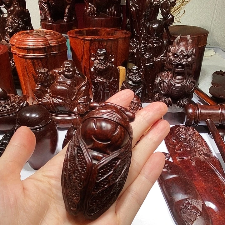 昌***哥小叶紫檀印度小叶紫檀一鸣惊人手把件工艺品