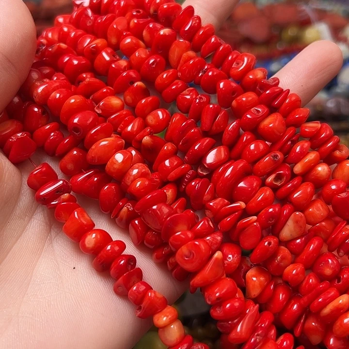 玛瑙/玉髓合金珠宝半成品W128。 9mm橘闪贝随形碎石一条