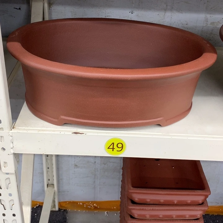 白***朵紫砂花盆紫砂花盆