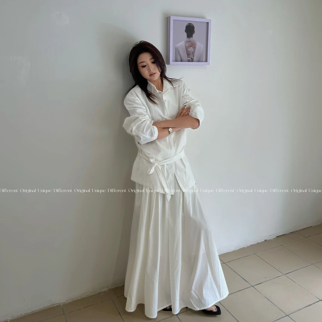 DOU×【兰亭序】初春新款松显瘦时尚弛慵懒伞裙高腰垂感灵动半身裙