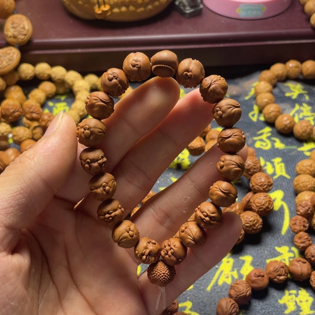 龙纹桃核雕刻百态