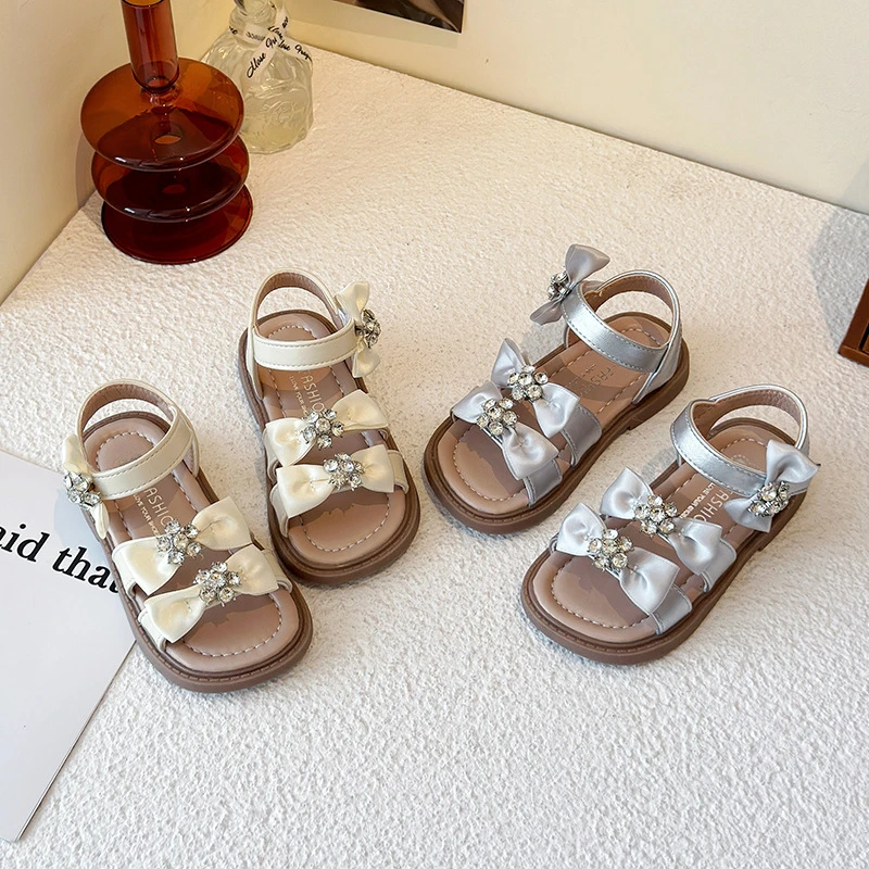 女童凉鞋2025夏季新款蝴蝶结水钻露趾宝宝公主鞋中大童时尚沙滩鞋