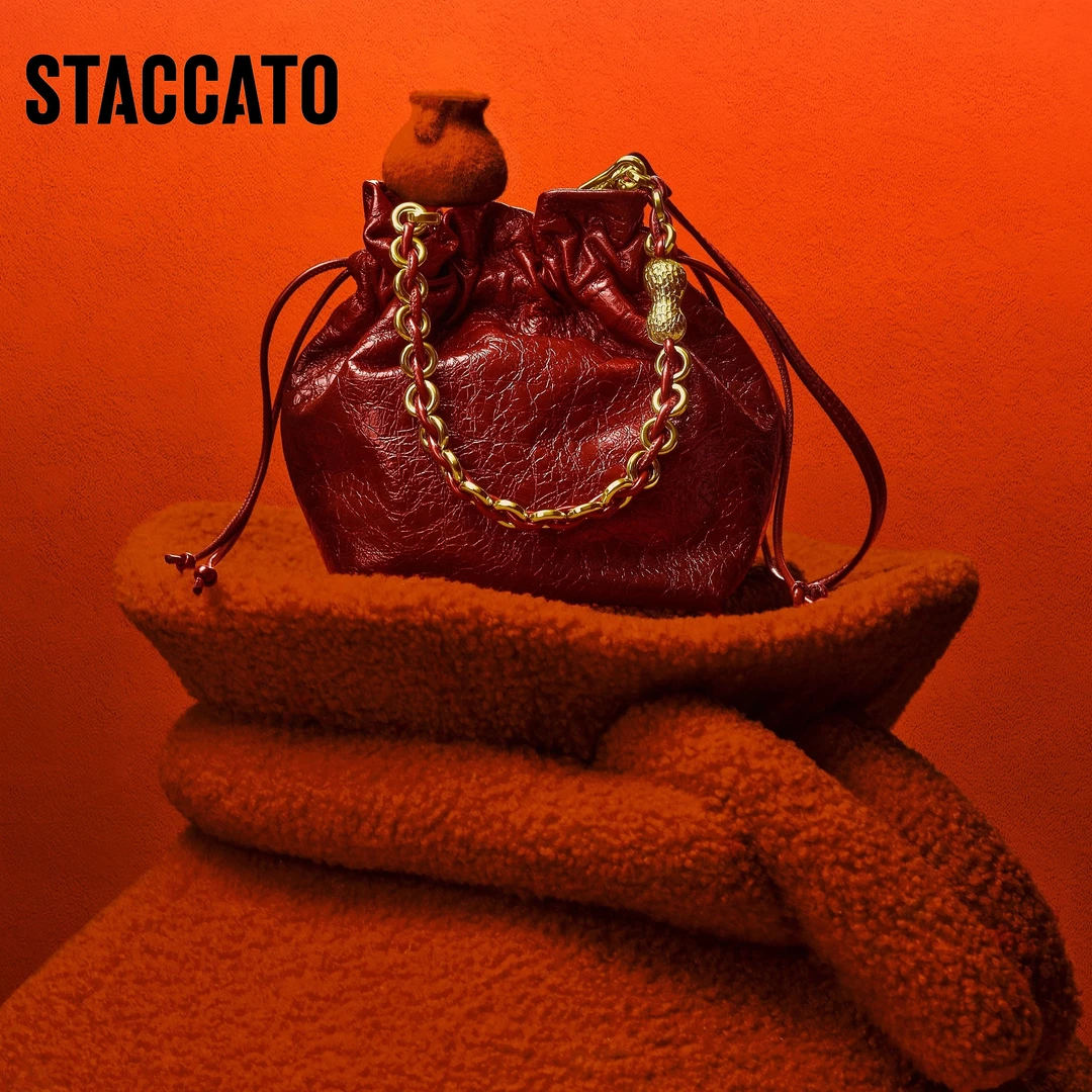 【商场同款新品】思加图2025春夏水桶包单肩斜挎时尚背提包X8161AX5