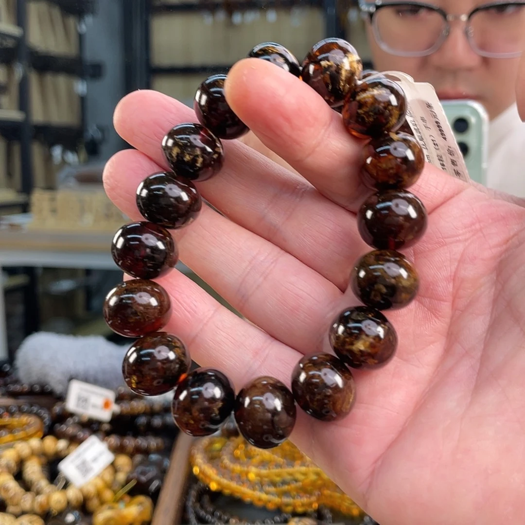 斋***斋琥珀未镶嵌裸石16花蜡手串