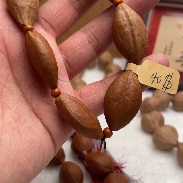 橄榄核吊坠两花手串