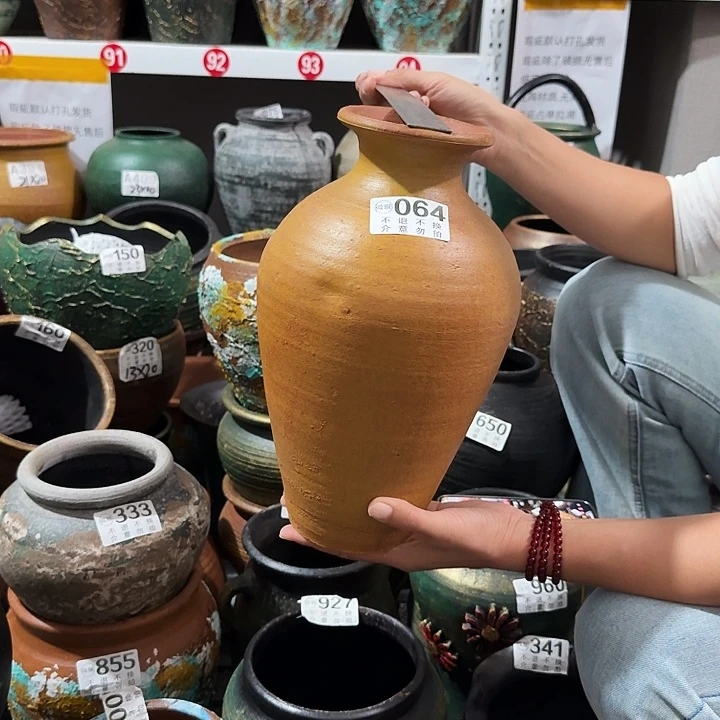 瑕疵黄色瓶064高度30外口10