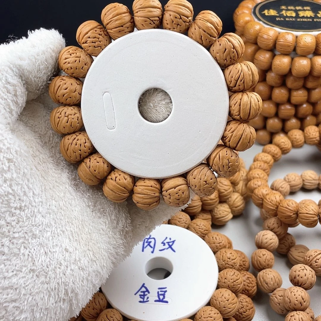 吊坠桃核P****_货头一代树王纽扣