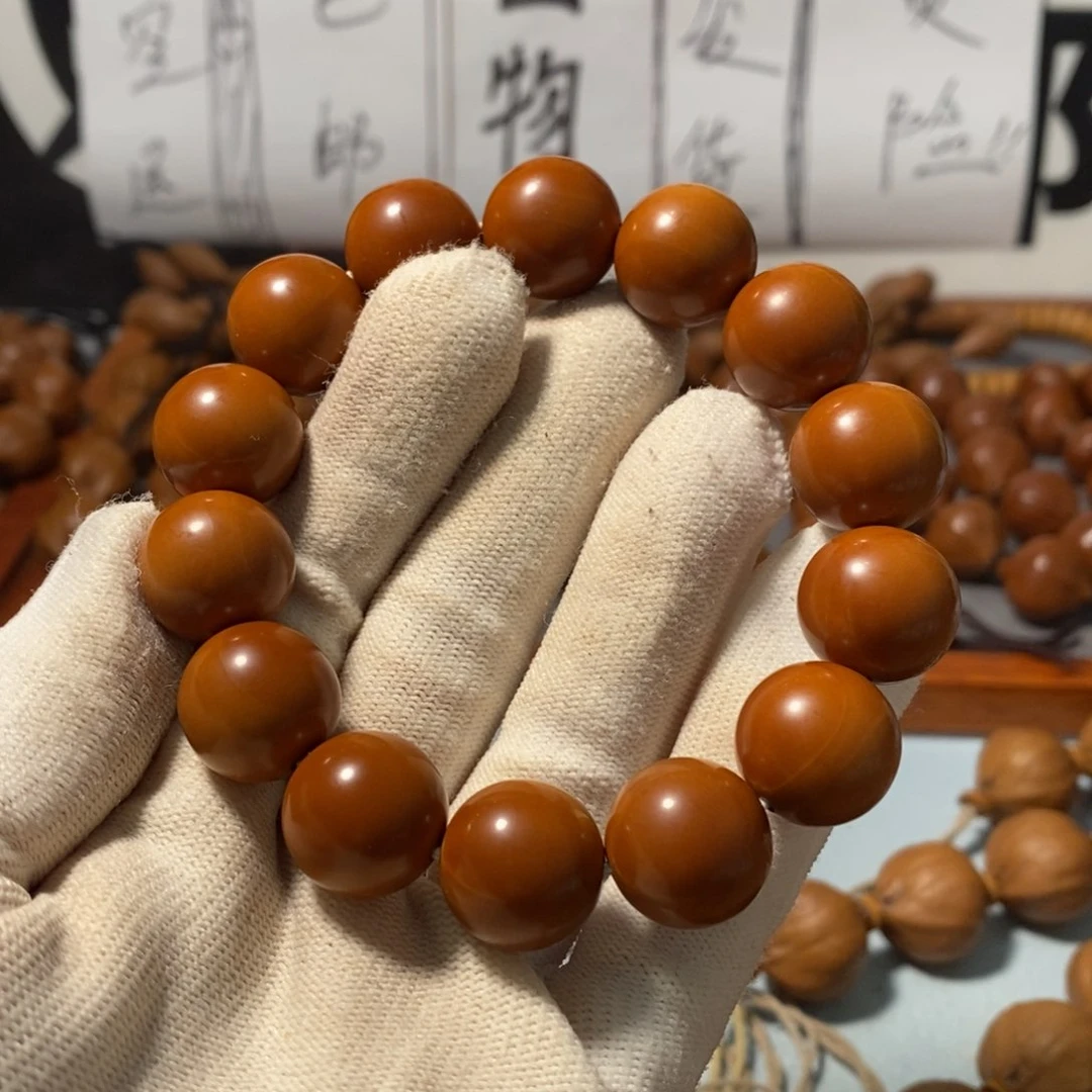 橄榄核手串百***姐15+精品极限小孔道正圆光珠