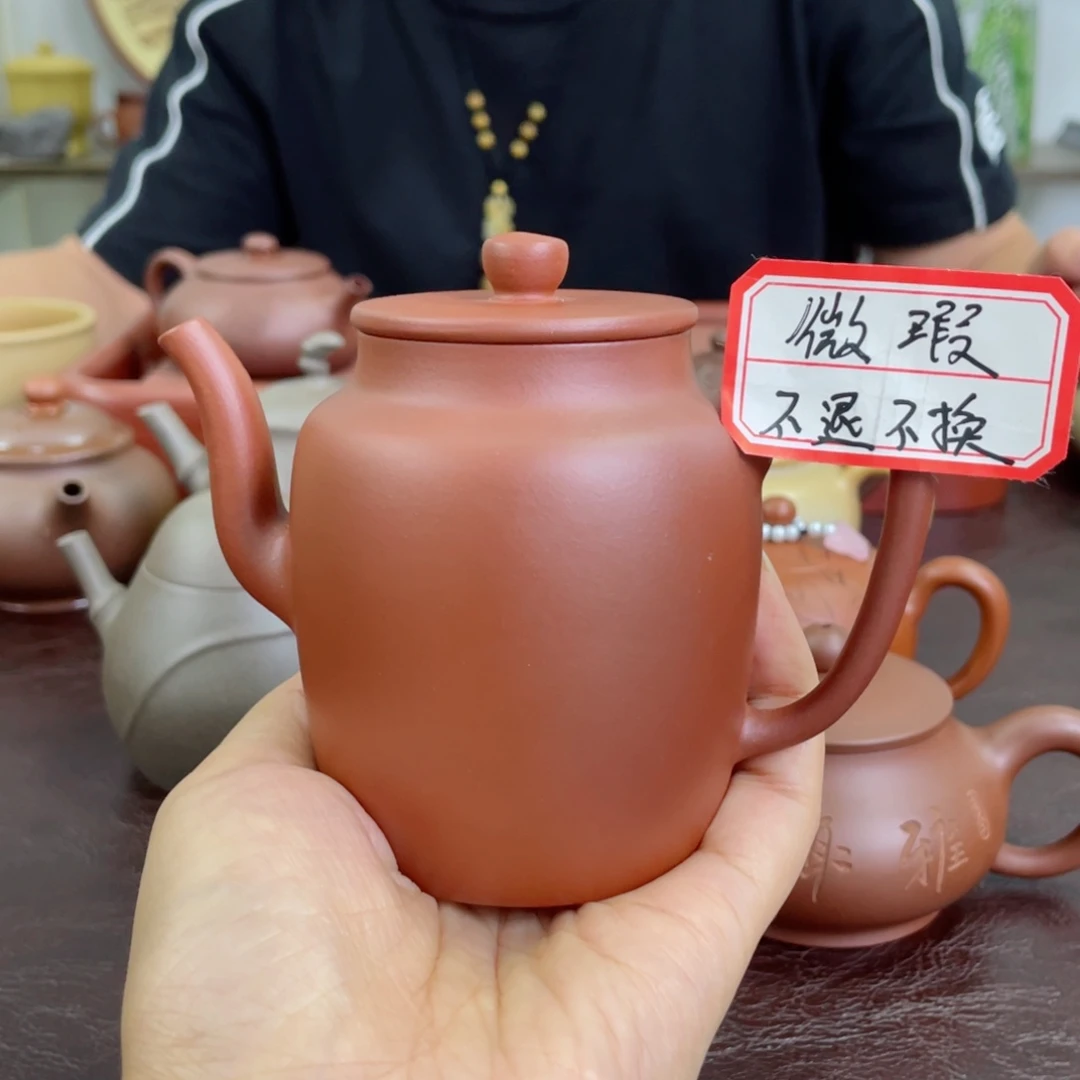 G***h紫砂茶壶高置。