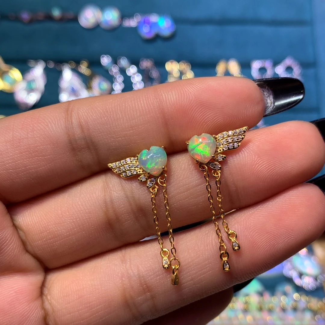 请***直欧泊银S925镶嵌耳饰