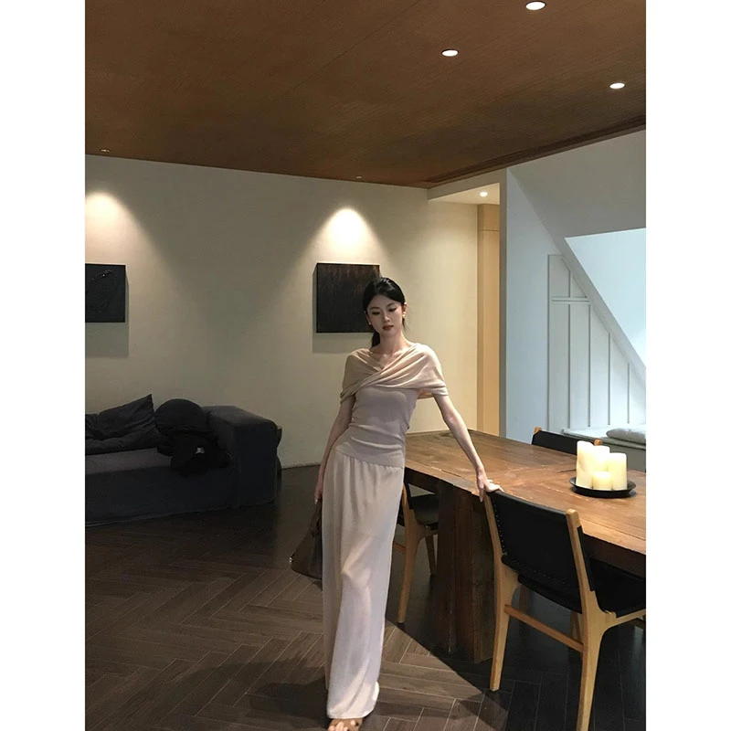 设计感多穿气质针织上衣女夏季2025新款休闲垂感收腰半身裙套装