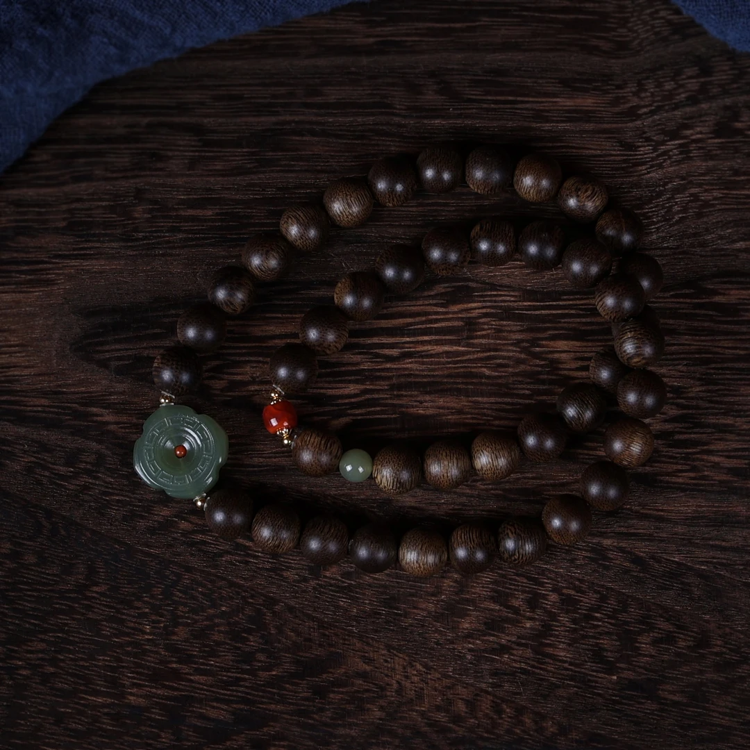 沉香沉香手串-帝王紫棋楠0.8平安扣双圈款