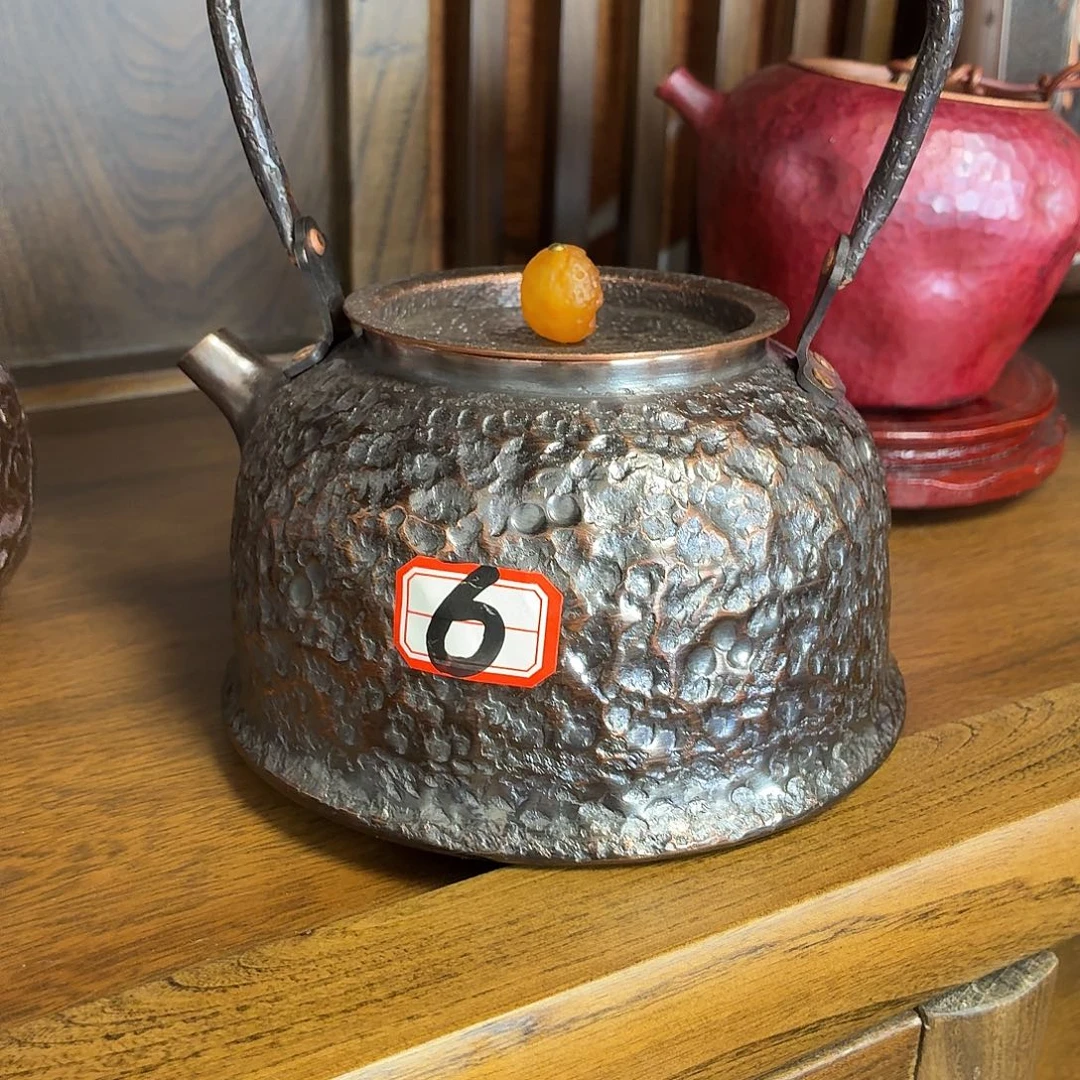 胥***幺全紫铜加厚石头纹提梁壶