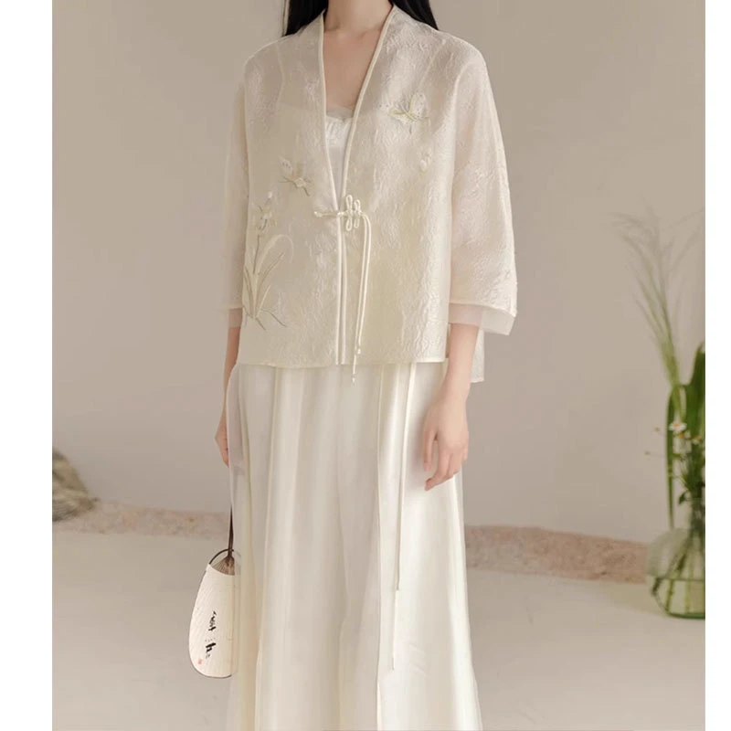 2025年春季新款温柔清雅禅意复古新中式改良盘扣高级国风日常套装
