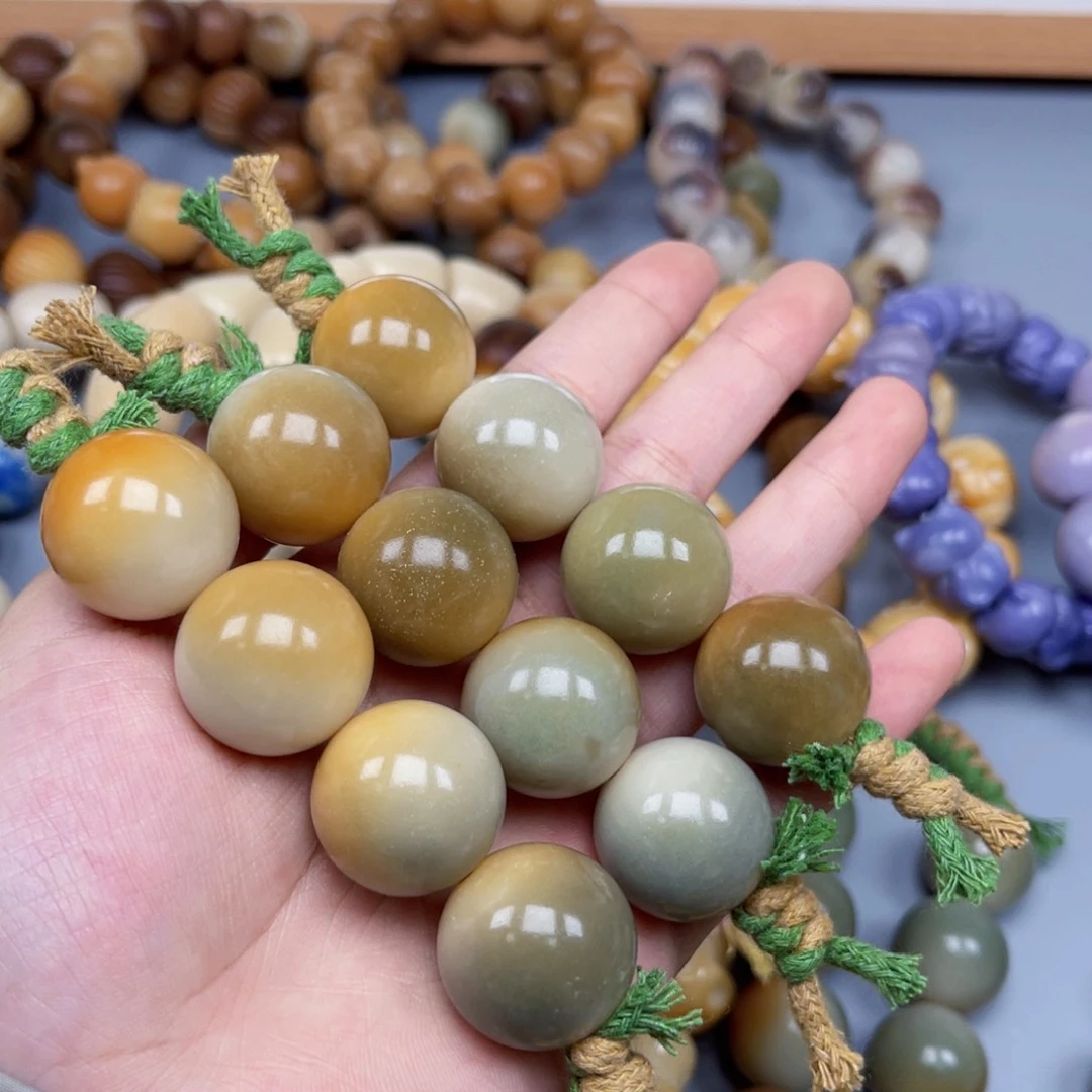 吊坠菩提根/象牙果A603圆珠20-22微瑕一串随机