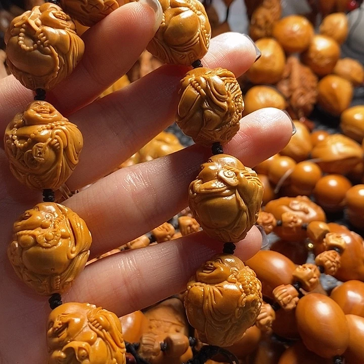 吊坠橄榄核T****尘瑞兽弥勒