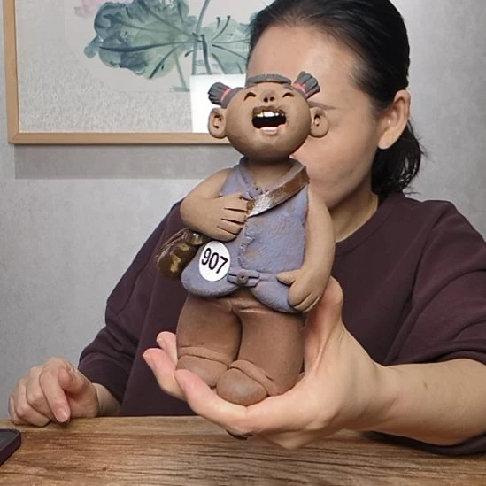 粗砂不规则羲媧娃系列作品书包女娃