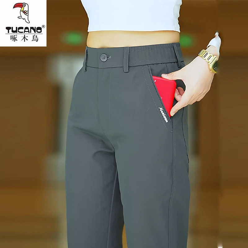 啄木鸟夏季薄款冰丝休闲裤男士2025新款高端商务男士西裤透气长裤