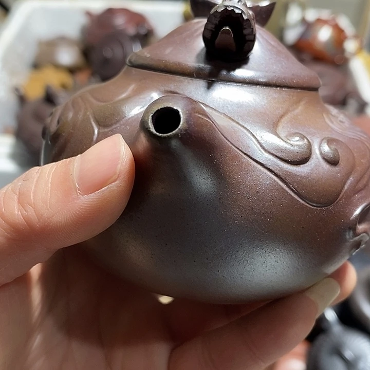紫砂茶壶舌头碎了