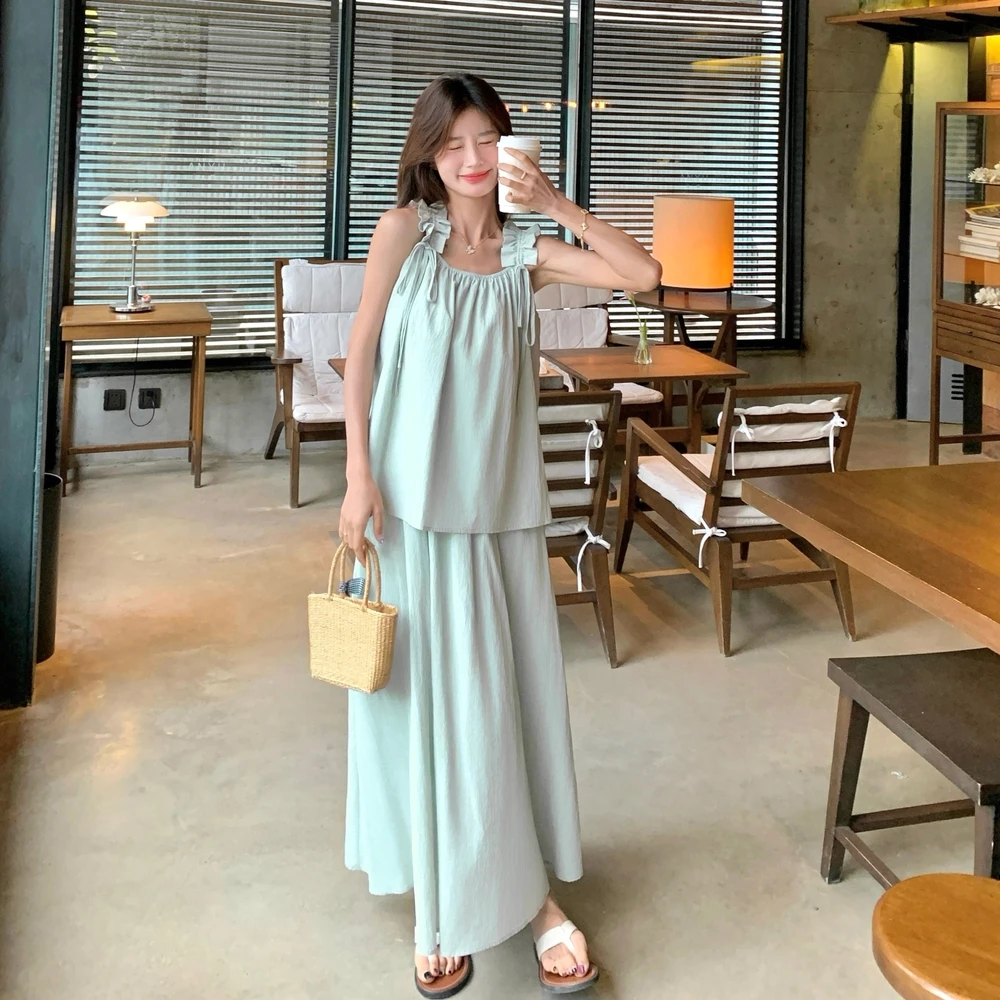 度假风绿色无袖半身裙套装女夏2025新款显瘦遮肉清纯系流行两件套