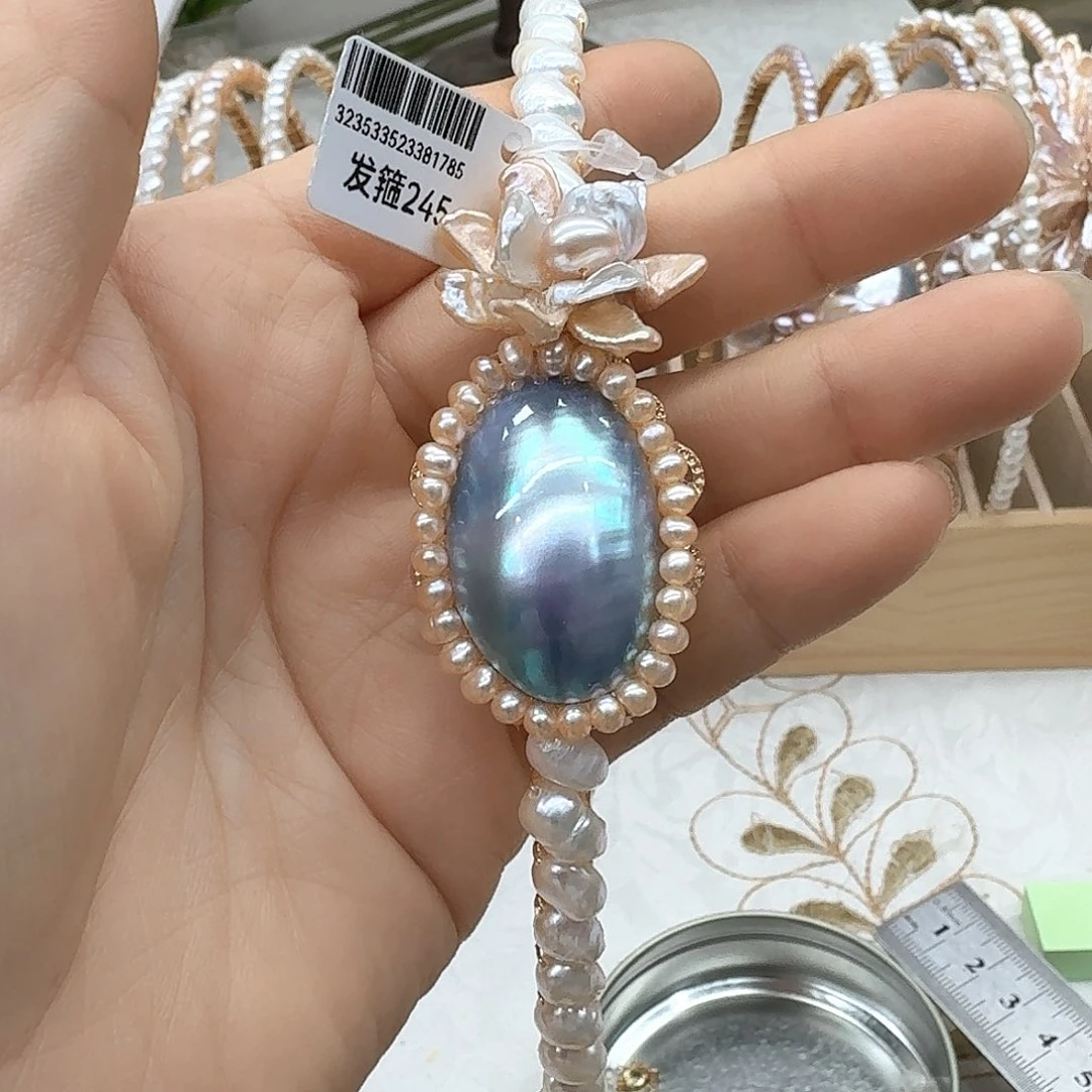 沐***苒未镶嵌淡水珍珠发饰